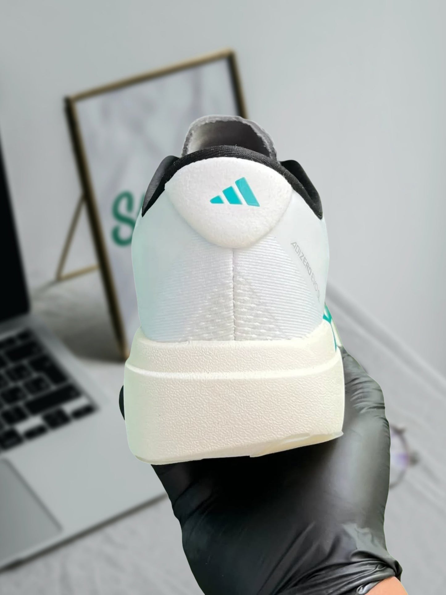 ADIDAS ADIZERO EVO SL “WHITE PURE TEAL