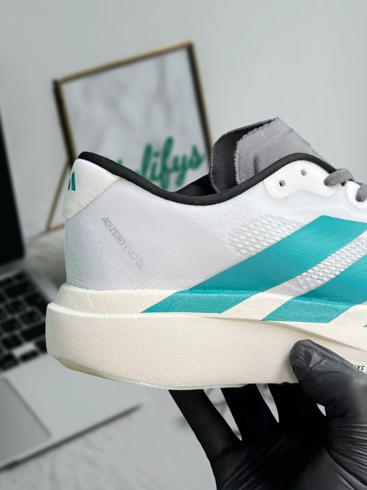 ADIDAS ADIZERO EVO SL “WHITE PURE TEAL