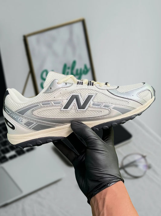 NEW BALANCE 204L “SILVER METALLIC BLACK