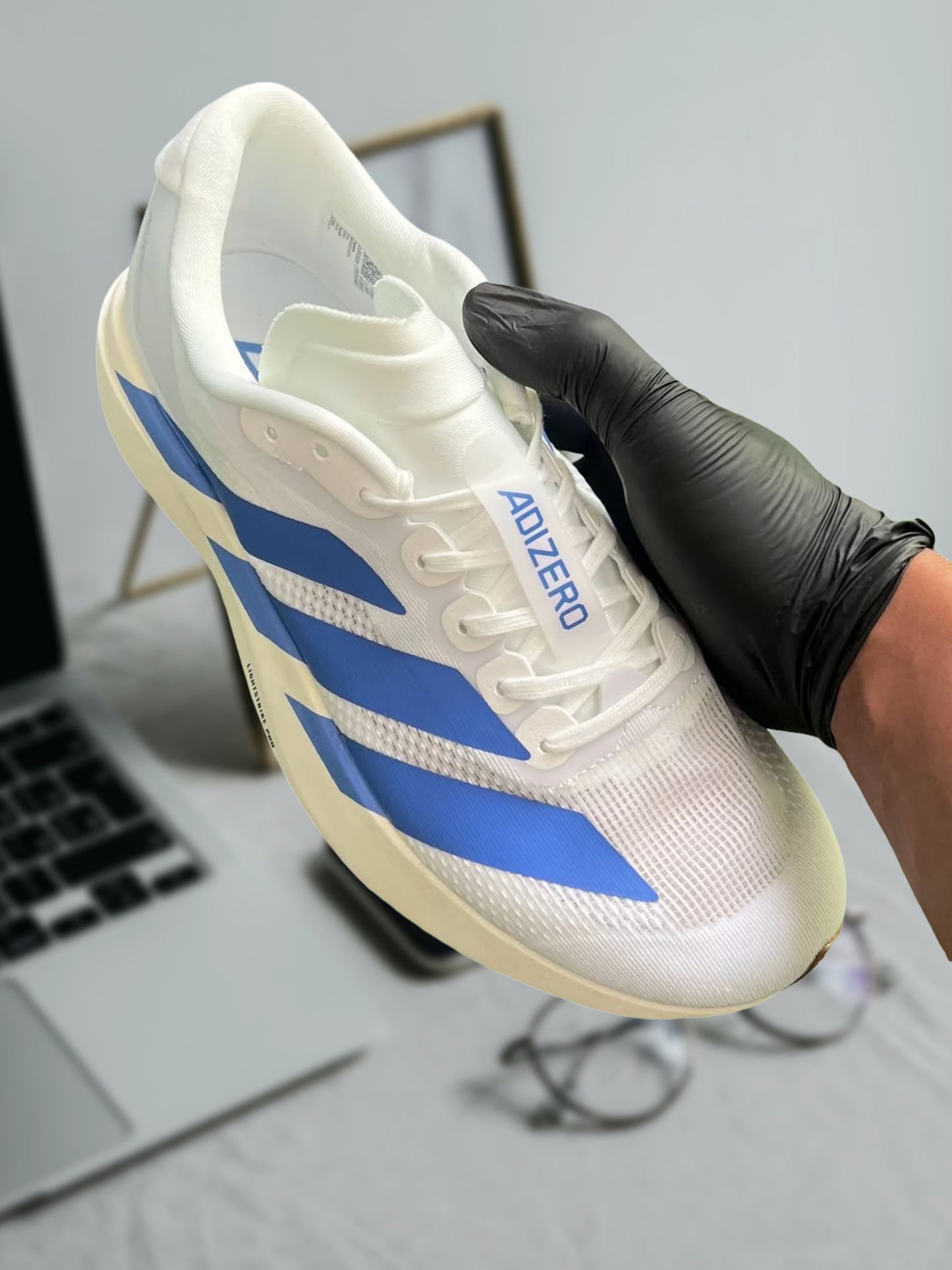 ADIZERO EVO SL "WHITE ROYAL BLUE