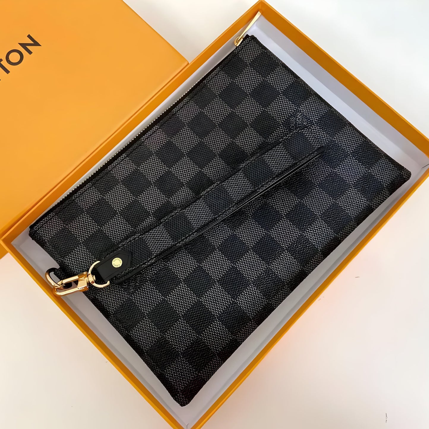 LOUIS VUITTON KASAI CLUTCH IN DAMIER GRAPHITE CANVAS