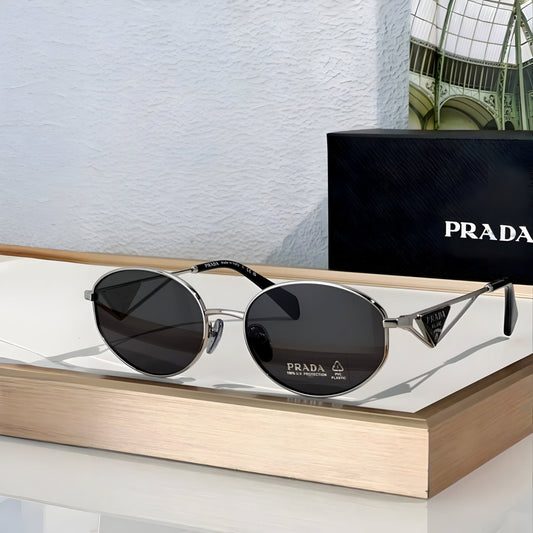 PRADA SYMBOLE ROUND METAL SUNGLASSES