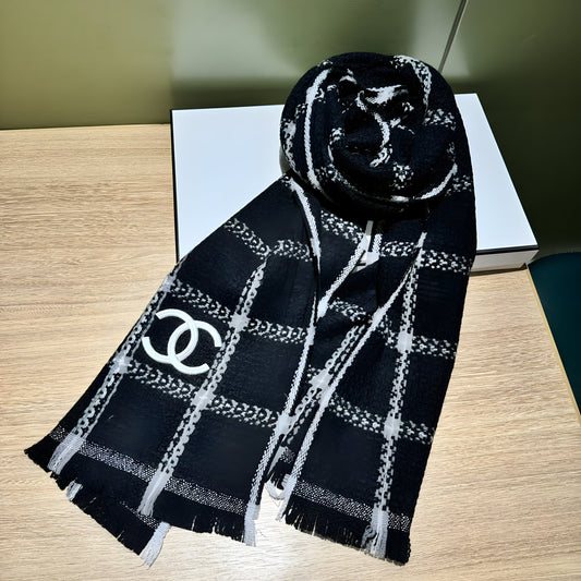 CHANEL WOMEN'S BLACK AND WHITE PLAID SCARF.