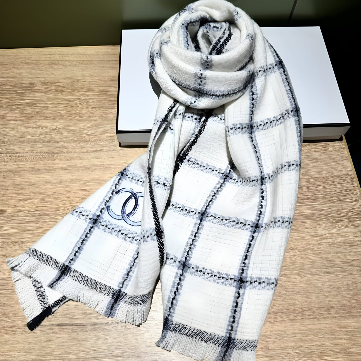 CHANEL WOMEN'S BLACK AND WHITE PLAID SCARF.