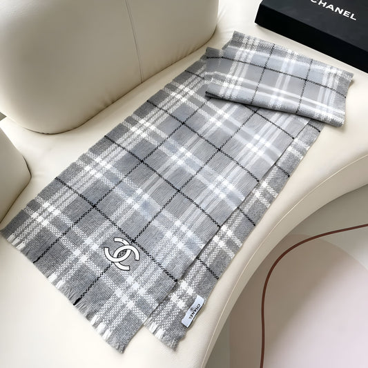 CHANEL WOMEN'S BLACK AND WHITE PLAID SCARF.