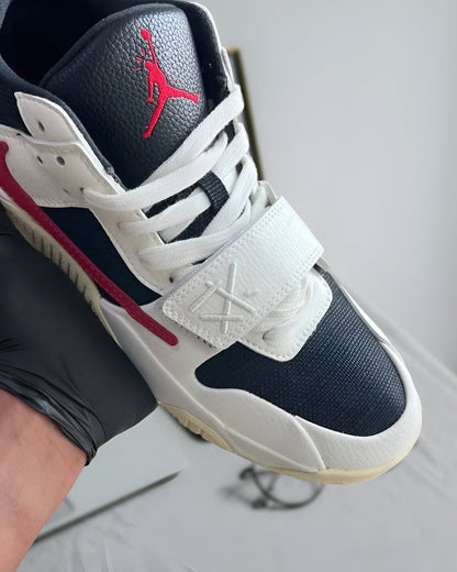 JORDAN JUMPMAN JACK TR
TRAVIS SCOTT UNIVERSITY RED